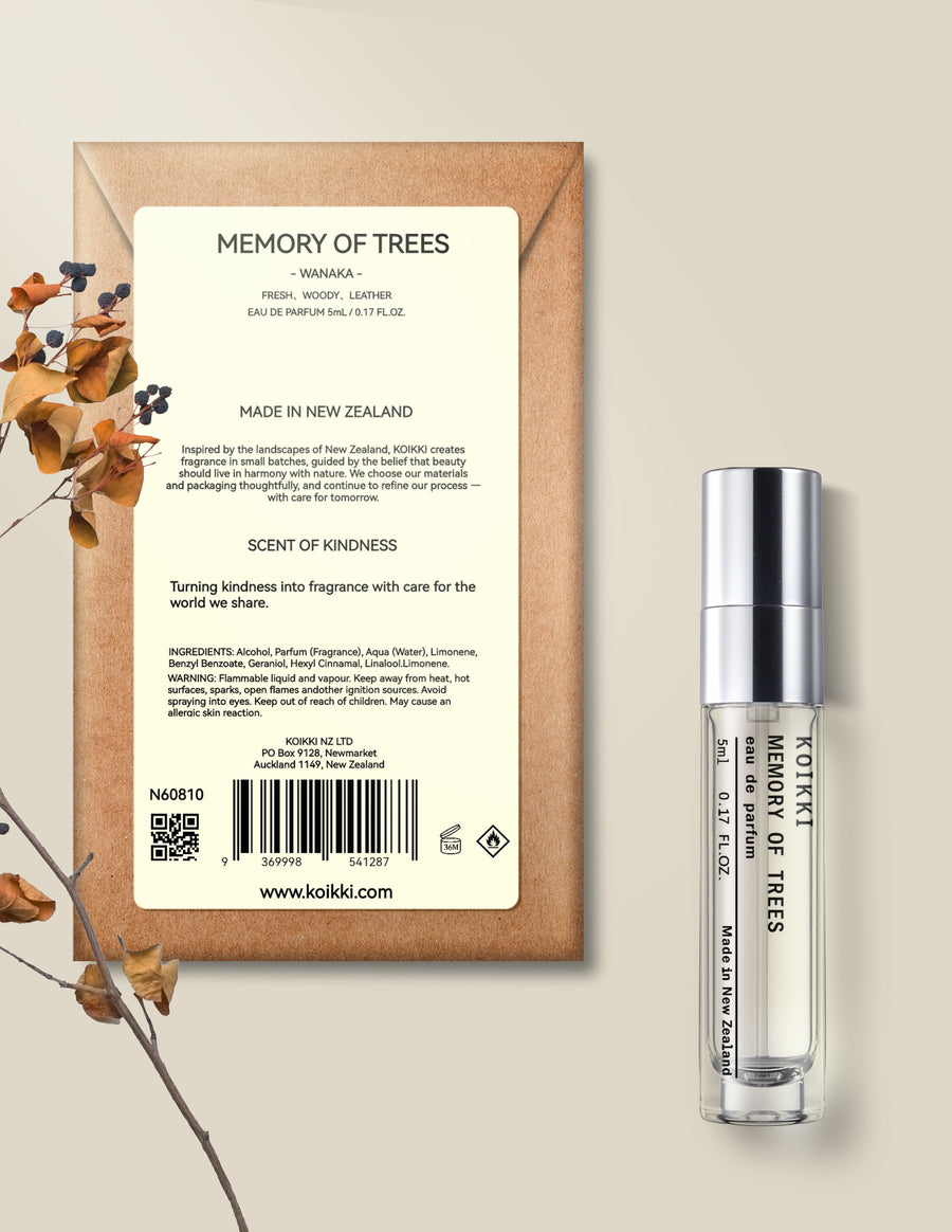 KOIKKI Memory of Trees 5ml eau de parfum spray bottle beside its Wanaka packaging.